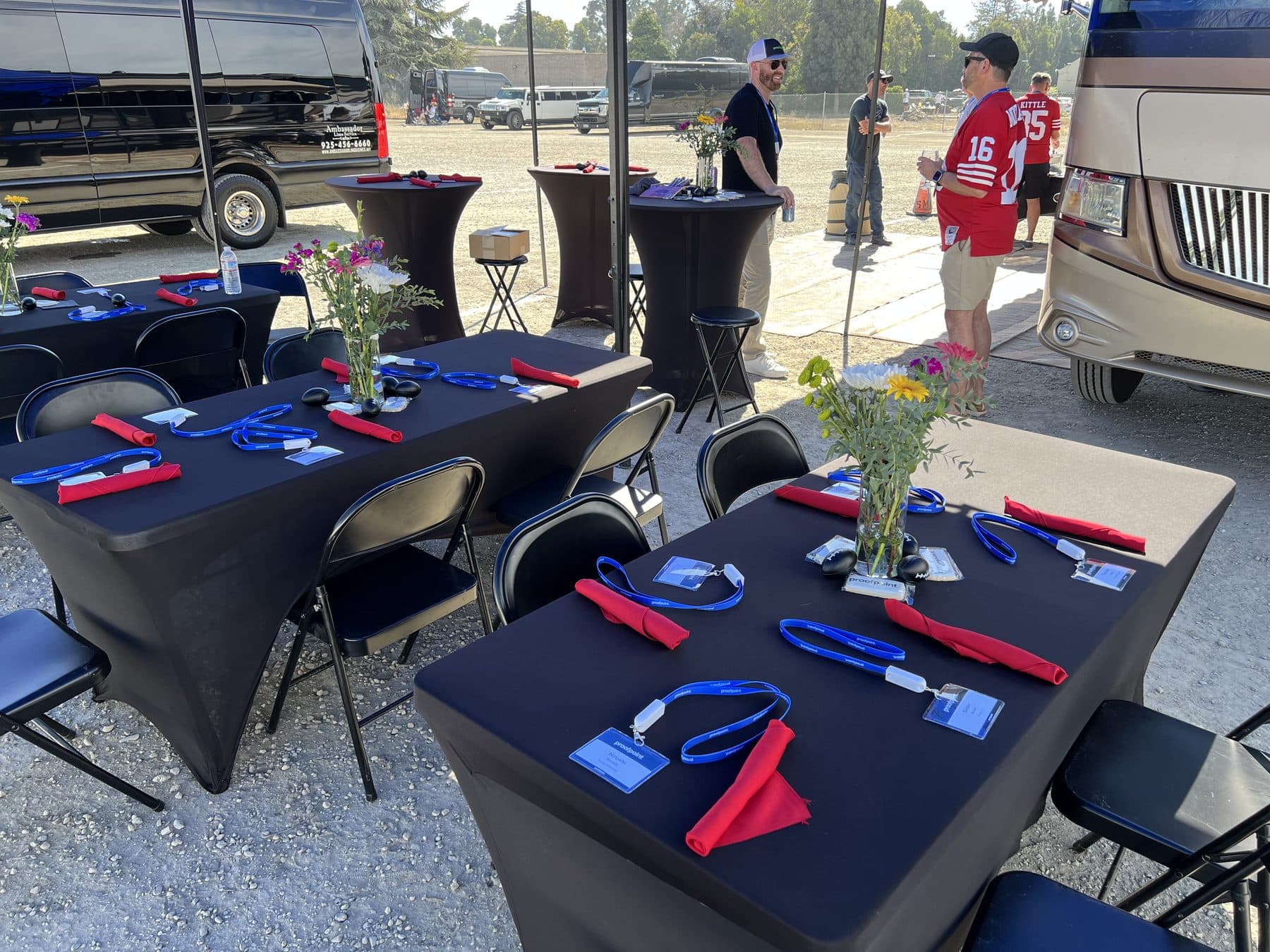 Tailgate tables dressed and set before kickoff