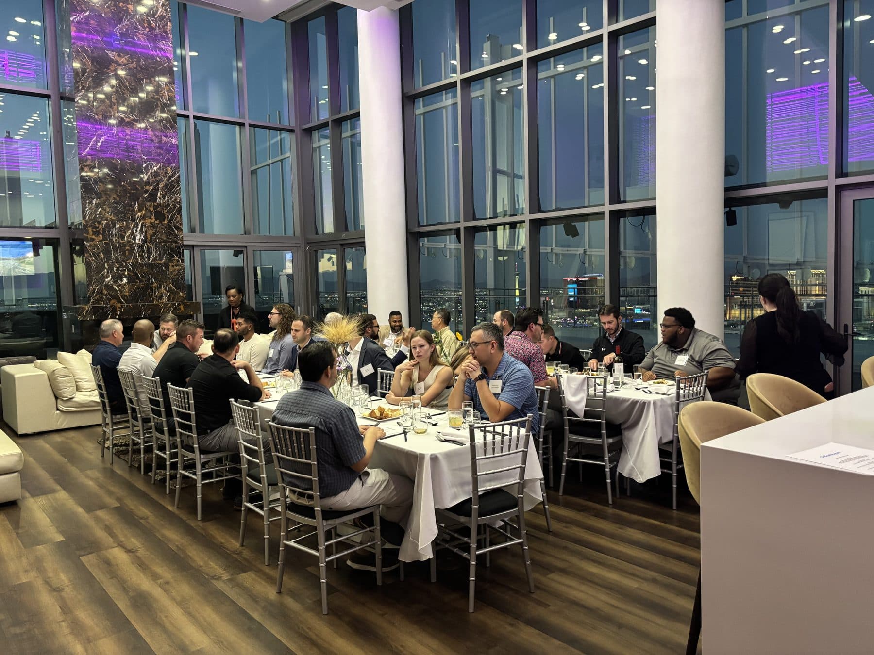 Guests at a private dinner high above the city